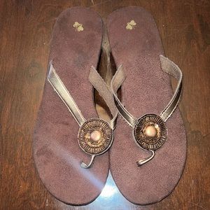 Brown wedge flip flops